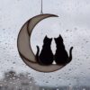 Hanging Suncatcher 2 Black Cats On The Moon stained glass window is a unique handmade decor, idea for an birthday and Christmas gift for an animal lover. This cute miniature art can decorate your home and garden outdoor decor, and pet loss memorial.