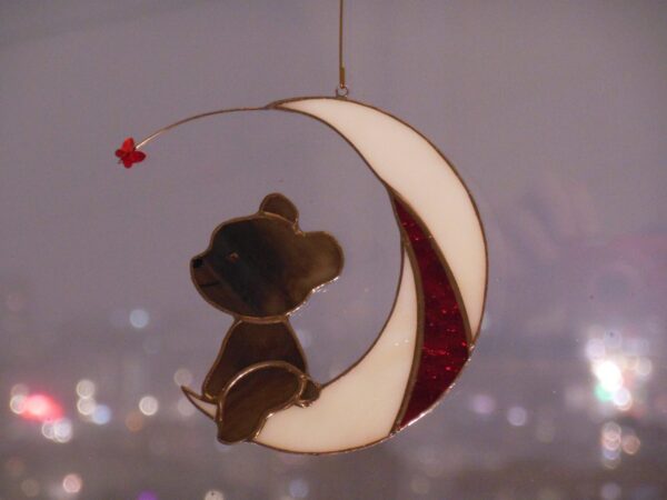Hanging Suncatcher Bear on the Moon with a Butterfly stained glass is a unique handmade decor, idea for birthday and Christmas gift for your child. This cute miniature art can decorate your the window and wall in your home and garden outdoor decor.