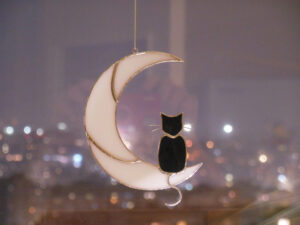 Hanging Suncatcher Black Cat On Moon stained glass window is a unique handmade decor, idea for anniversary, birthday and Christmas gift for an animal lover. This cute miniature art can decorate your home and garden outdoor decor, pet loss memorial.