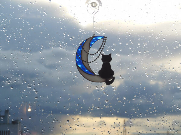 Black Cat On Moon with Chains Original Art stained glass hanging Suncatcher Gift for animal lover pet loss memorial White , blue and black Hanging Suncatcher Black Cat On Moon with Chains stained glass window is unique handmade decor, idea for birthday and Christmas gift for an animal lover. This cute miniature art can decorate your home and garden outdoor decor, and pet loss memorial.