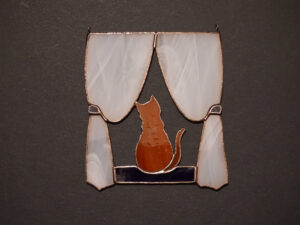 Hanging Suncatcher Cat in the Window stained glass is a unique handmade decor, idea for birthday and Christmas gift for animal lover. This cute art miniature can decorate your wall in your home and garden outdoor decor, and pet loss memorial.