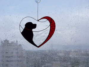 Hanging Suncatcher Black Retriever Labrador in Heart stained glass is unique handmade decor, idea for birthday and Christmas gift for an animal lover. This cute miniature art can decorate your home and garden outdoor decor, and pet loss memorial.