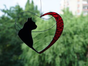 Hanging Suncatcher Black Cat in Heart stained glass is a unique handmade decor, idea for Christmas gift for an animal lover. This cute miniature art can decorate your the window and wall in your home and garden outdoor decor, and pet loss memorial.