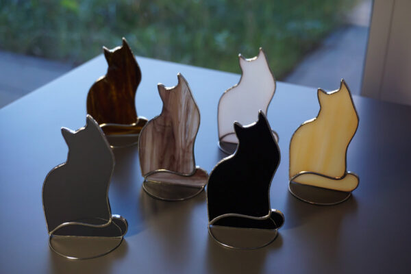 Cat Original Stained glass hanging standing shelf sitters Suncatcher, black , white, gray , brown mottled , cocoa , amber. Gift animal lover Suncatcher Cat is made of colored glass in stained glass Tiffany technique, hanging or standing on table, shelf sitters . There are color options for cats - black, white, gray, brown mottled, cocoa color, and light amber